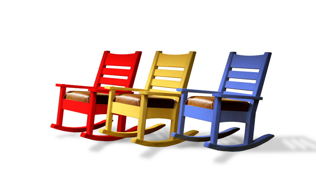 red yellow and blue rocking chair
